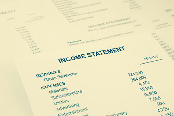 Obraz premium Income statement reports for business accounting in sepia tone