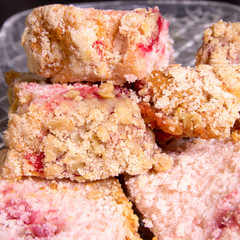 Strawberry crumble bars on a plate