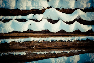 Snow covered wood stack