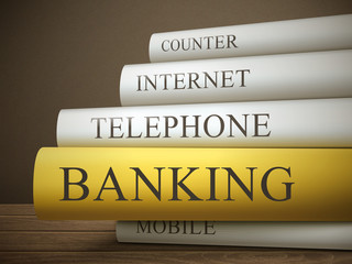 book title of banking isolated on a wooden table