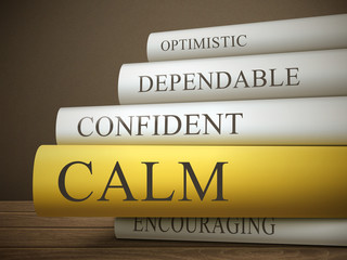 book title of calm isolated on a wooden table