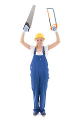 young woman in blue builder uniform with two saw isolated on whi