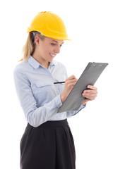 business woman in builder helmet writing something in clipboard