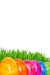 Rainbow colored Easter Eggs grass