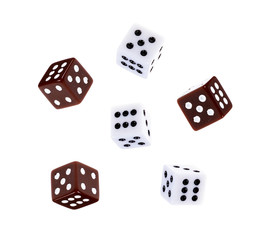 White and colored dice through the Air Isolated on White