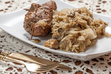 Beef roulade with cabbage.