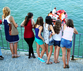 Group of girls, rescue boat
