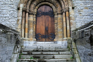 Gorgeous wood doors in old stone structure