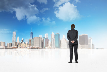 businessman looking to city