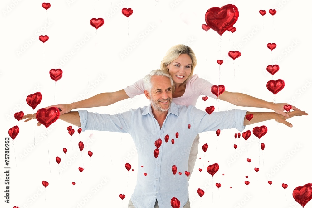 Aufkleber composite image of smiling couple posing with arms out