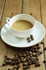 Coffee cup and beans