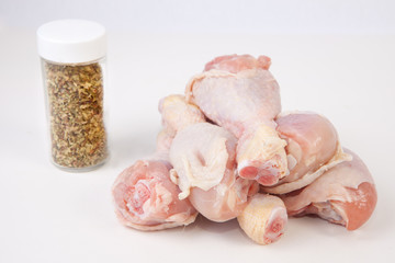 Raw chicken legs with herbs