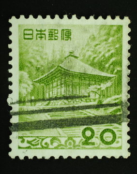 Postage stamp  image of an old Japanese house
