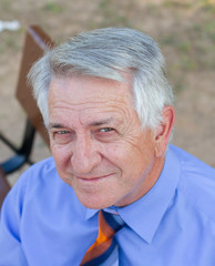Closeup of a businessman working with a tablet