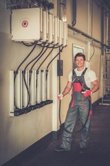 Young serviceman  in a workshop