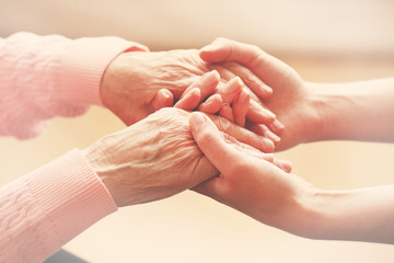 Helping hands, care for the elderly concept