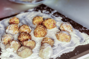 cooked patties cooking on wooden table