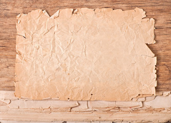 old paper on old wooden background