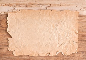 old paper on old wooden background