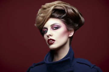 Beauty styled closeup portrait of a young woman