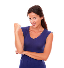 Fototapeta premium Happy woman in purple dress with arm up