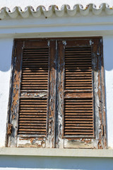 Old wooden window shutter in Portugal