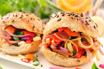 Vegetarian sandwich with fried onions and peppers