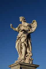 Fototapeta na wymiar Statue on Ponte Sant'Angelo in Rome, Italy