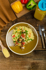 Couscous with vegetables and chicken skewer