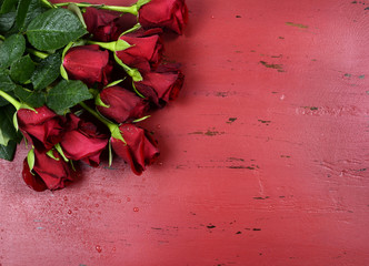 Happy Valentines Day wood background with red roses 