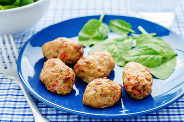 baked meatballs with pepper and spinach