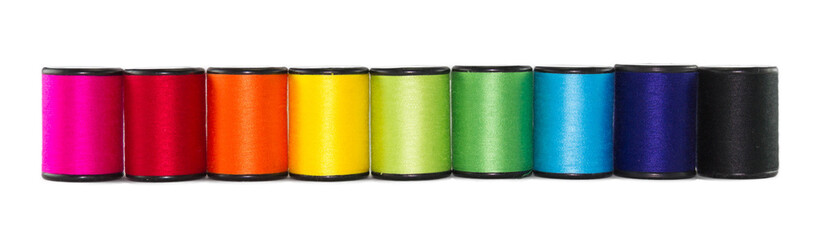 set of color threads on a white background