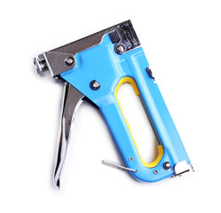 Construction stapler isolated on white