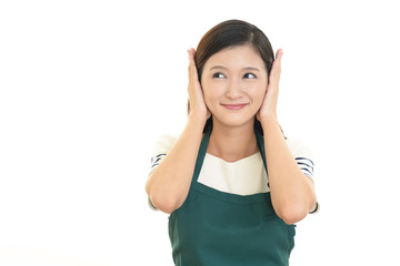 Fototapeta premium 耳をおさえる女性