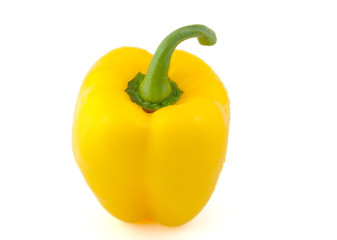 Close up of yellow pepper on white background.