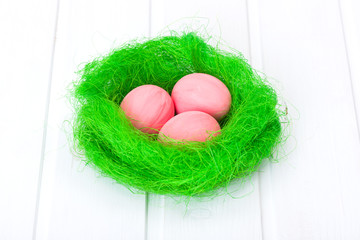 Easter eggs in green nest
