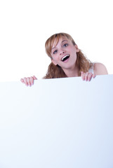 Young woman posing with a placard