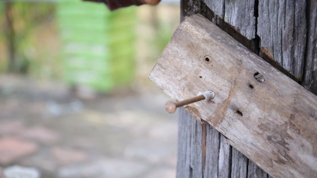 Closeup of Carpenter use equipment to repare the furniture