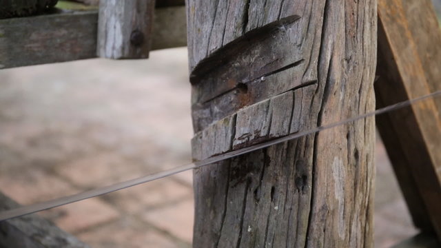 Closeup of Carpenter use equipment to repare the furniture