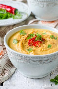 Carrot cream soup with red chili pepper