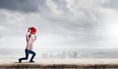 Man with red bag