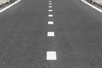 Dividing line on surface street.