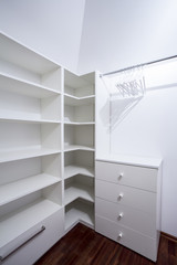 Empty white wardrobe in modern house