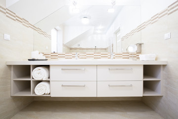 White furniture in bright bathroom