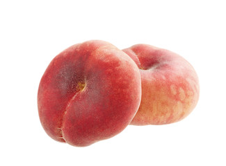 flat peaches isolated on white