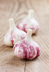 garlic whole on a wooden rustic background