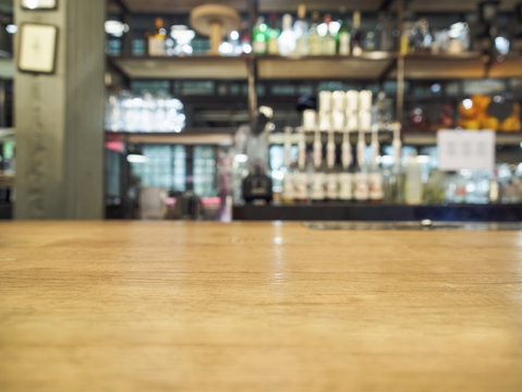 Top of table in restaurant with bar background