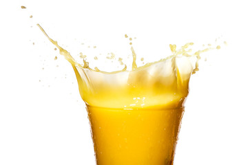 Fototapeta na wymiar Orange juice. Splash in glass. Isolated on white