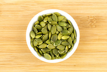 Fresh pumpkin seeds in bowl