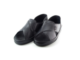 black patent leather men shoes against white background